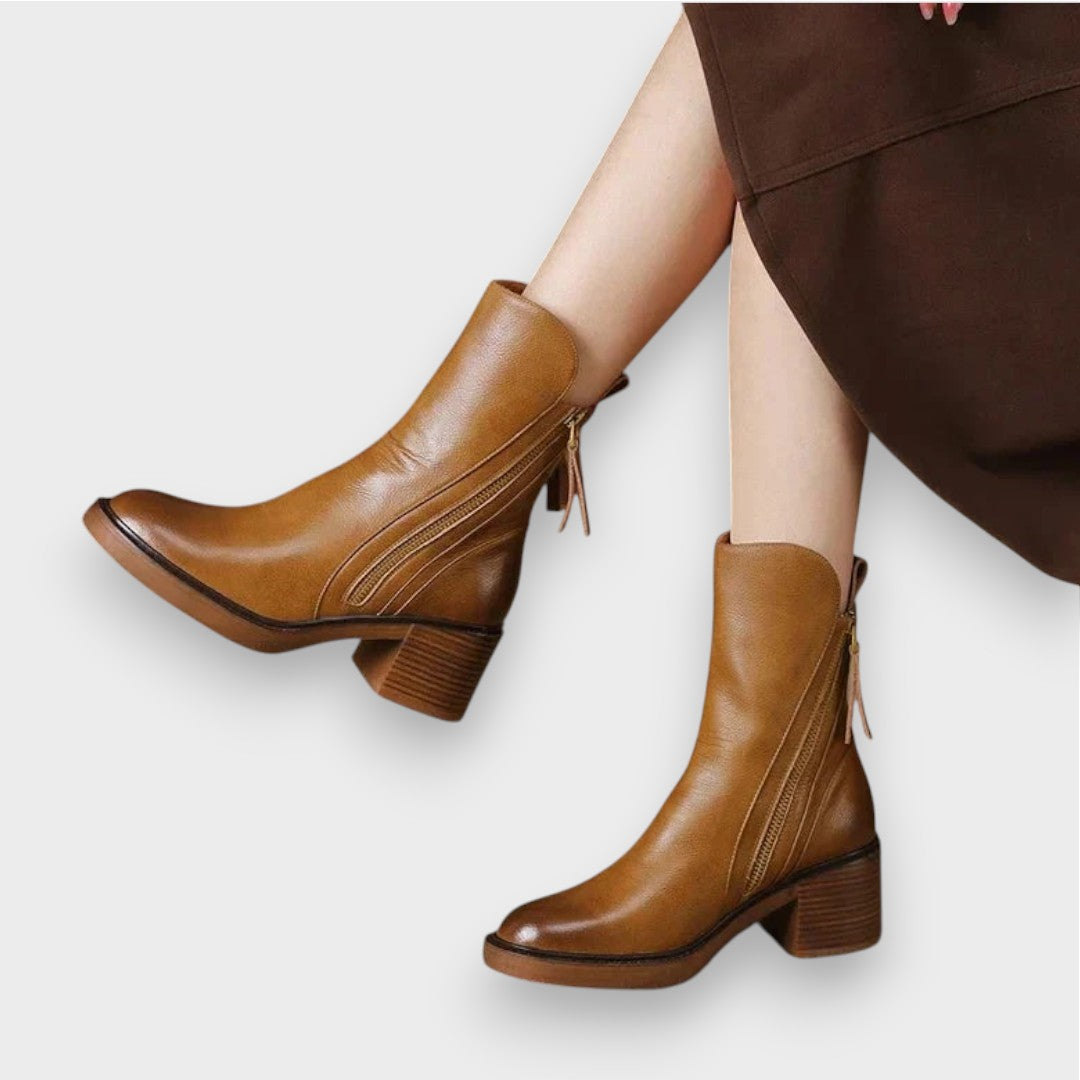 "Klara | Ādas potīšu zābaki" can be rewritten as "Klara | Ādas Ankle Boots".